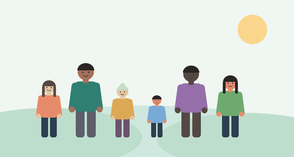 People of different ages and backgrounds standing together outdoors